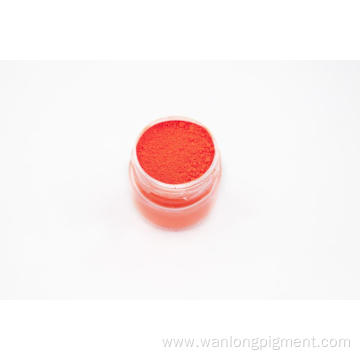 Orange-red fluorescent pigments for plastics and inks